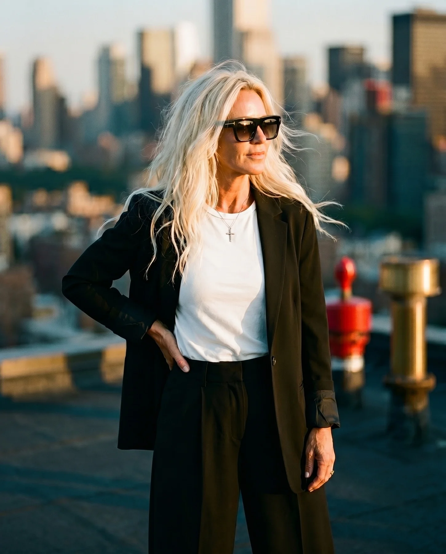 Krisztina Maria on a Manhattan rooftop at golden hour